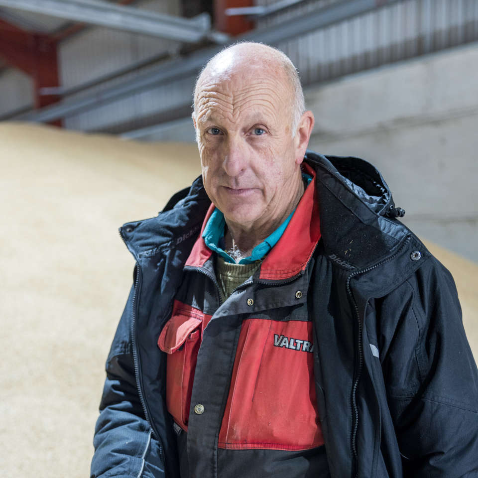Photo of Rob Burden in a grain warehouse